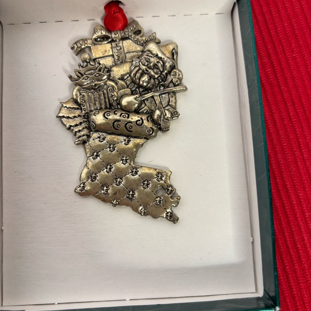Lee Michaels Christmas Ornament. Stocking shaped like Louisiana. 11th in Series